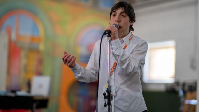 Rebecca talking at a conference