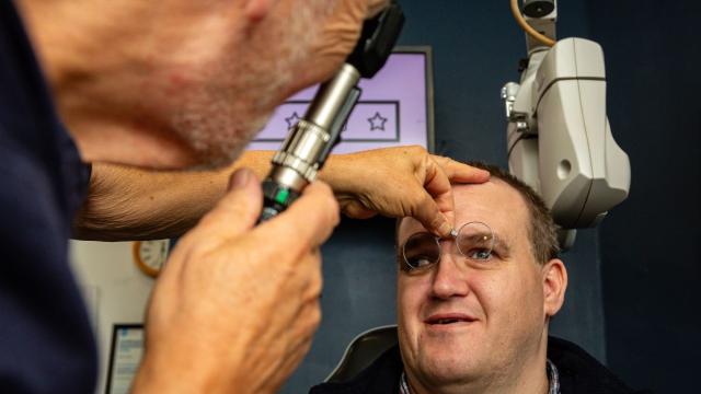 Adam having an eye test